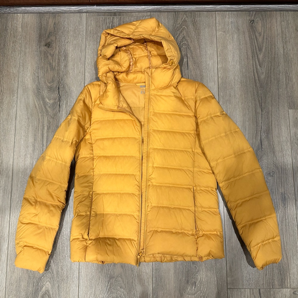 Uniqlo down jacket with hood . Size extra small